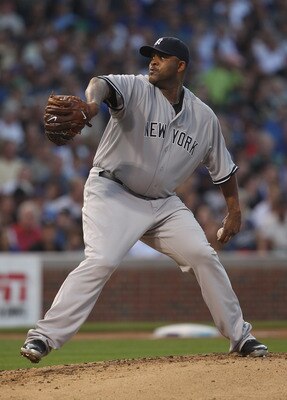 CHICAGO, IL - JUNE 19:  Starting pitcher C.C. Sabathia #52 of the New York Yankees delivers the ball against the Chicago Cubs at Wrigley Field on June 19, 2011 in Chicago, Illinois.  (Photo by Jonathan Daniel/Getty Images)