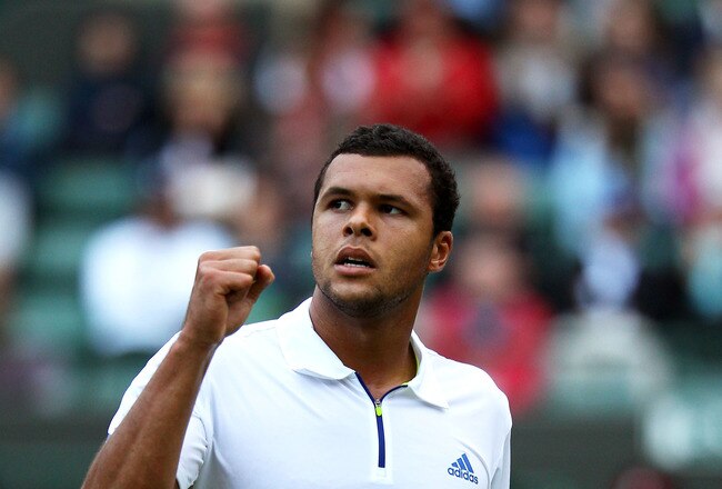 LONDON, ENGLAND - JUNE 23:  Jo-Wilfried Tsonga of France reacts during his second round match against Grigor Dimitrov of Bulgaria on Day Four of the Wimbledon Lawn Tennis Championships at the All England Lawn Tennis and Croquet Club on June 23, 2011 in Lo