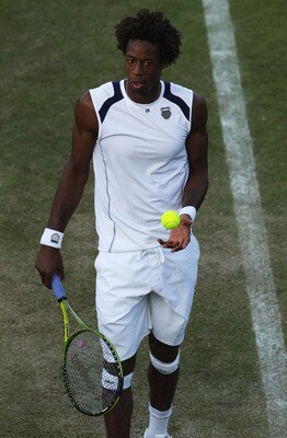 LONDON, ENGLAND - JUNE 22:  Gael Monfils of France in action during his second round match against  Grega Zemlja of Slovenia on Day Three of the Wimbledon Lawn Tennis Championships at the All England Lawn Tennis and Croquet Club on June 22, 2011 in London