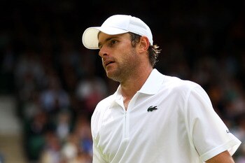 LONDON, ENGLAND - JUNE 24:  Andy Roddick of the United States reacts to a play during his third round match against Feliciano Lopez of Spain on Day Five of the Wimbledon Lawn Tennis Championships at the All England Lawn Tennis and Croquet Club on June 24,