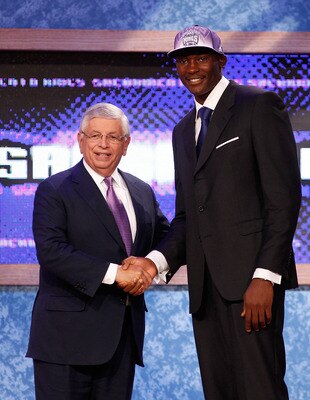 NEWARK, NJ - JUNE 23:  Bismack Biyombo from the Congo greets NBA Commissioner David Stern after he was picked #7 overall by the Sacramento Kings in the first round during the 2011 NBA Draft at the Prudential Center on June 23, 2011 in Newark, New Jersey.