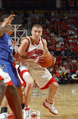 COLLEGE PARK, MD - JANUARY 8:  Steve Blake #25 of the Maryland Terrapins drives against Barry Hairston #33 of the Hampton Pirates during the game at Comcast Center on January 8, 2003 in College Park, Maryland.  The Terrapins won 108-58.  (Photo by Doug Pe