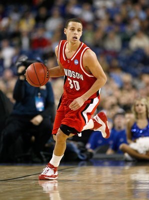DETROIT - MARCH 30:  Stephen Curry #30 of the Davidson Wildcats brings the ball up court against the Kansas Jayhawks during the Midwest Regional Final of the 2008 NCAA Division I Men's Basketball Tournament at Ford Field on March 30, 2008 in Detroit, Mich