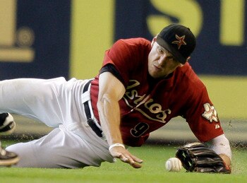 HOUSTON - JUNE 26:  Right fielder Hunter Pence #9 of the Houston Astros makes a diving attempt on a ball hit by Wade Davis  #40 of the Tampa Bay Rays in the ninth inning at Minute Maid Park on June 26, 2011 in Houston, Texas.  (Photo by Bob Levey/Getty Im