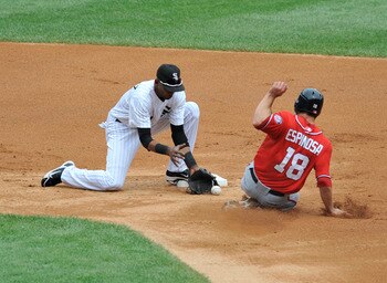 CHICAGO, IL - JUNE 25:  Alexei Ramierez # 10 of the Chicago White Sox tries to tag Danny Espinosa #18 of  the Washington Nationals on June 25, 2011 at U.S. Cellular Field in Chicago, Illinois.  (Photo by David Banks/Getty Images)