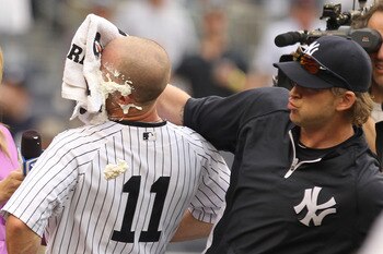 NEW YORK, NY - JUNE 16:  Brett Gardner #11 of the New York Yankees is hit in the face with a pie by teamate A.J. Burnett #34 after Gardner hit a walk off RBI single in the twelfth inning against the Texas Rangers on June 16, 2011 at Yankee Stadium in the