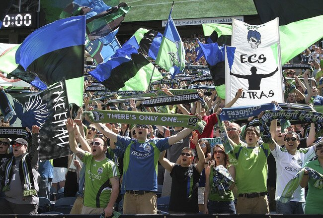 SEATTLE - JUNE 26:  Fans of the Seattle Sounders FC cheer against the New England Revolution at CenturyLink Field on June 26, 2011 in Seattle, Washington. The Sounders defeated the Revolution 2-1.
(Photo by Otto Greule Jr/Getty Images)