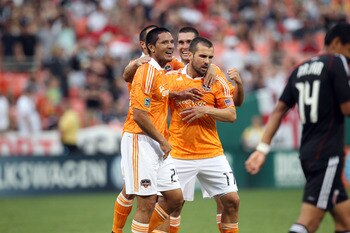 WASHINGTON, DC - JUNE 25: Brian Ching #25 of the Houston Dynamo celebrates a goal against D.C. United at RFK Stadium on June 25, 2011 in Washington, DC. (Photo by Ned Dishman/Getty Images)