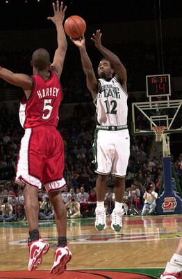 18 Mar 2000:  Mateen Cleaves #12 of Michigan State University takes a shot over Tony Harvey #5 of the University of Utah as the Spartans defeated the University of Utah 73-61 in round two of the Midwest Region of the 2000 NCAA Men''s Basketball Championsh