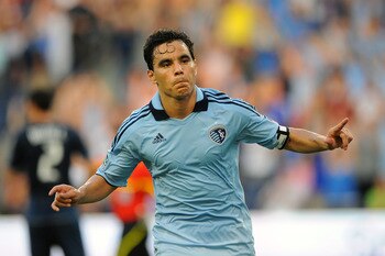 KANSAS CITY, KS - JUNE 25:  Omar Bravo #99 of Sporting Kansas City celebrates after scoring a goal on a penalty kick against the Vancouver Whitecaps FC on June 25, 2011 at LiveStrong Sporting Park in Kansas City, Kansas. (Photo by G. Newman Lowrance/Getty