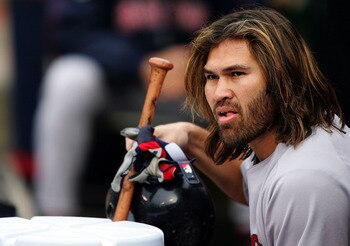OAKLAND , CA - MAY 17:  Johnny Damon #18 of the Boston Red Sox looks on against the Oakland Athletics during an MLB game at McAfee Coliseum on May 17, 2005 in Oakland, California.  (Photo by Jed Jacobsohn/Getty Images)