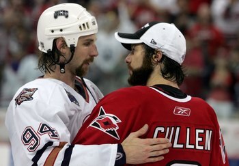 RALEIGH, NC - JUNE 19:  Matt Cullen #8 of the Carolina Hurricanes is congratulated by Ryan Smyth #94 of the Edmonton Oilers after winning in game seven of the 2006 NHL Stanley Cup Finals on June 19, 2006 at the RBC Center in Raleigh, North Carolina. The H