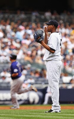 NEW YORK, NY - JUNE 26:  Ivan Nova #47 of the New York Yankees reacts after giving up a home run to Ty Wigginton #21 of the Colorado Rockies during their game on June 26, 2011 at Yankee Stadium in the Bronx borough of New York City.  (Photo by Al Bello/Ge