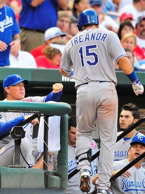 ST. LOUIS, MO - JUNE 18: Ned Yost #3 of the Kansas City Royals congratulates Matt Treanor #15 after he hit a solo home run against the St. Louis Cardinals at Busch Stadium on June 18, 2011 in St. Louis, Missouri.  (Photo by Jeff Curry/Getty Images)