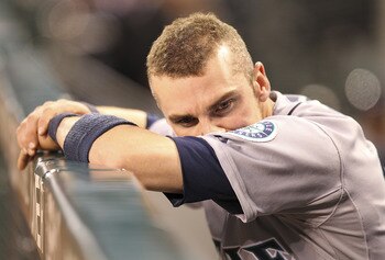 SEATTLE - JUNE 25:  Shortstop Brendan Ryan #26 of the Seattle Mariners reacts after the final out in 4-2 loss to the Florida Marlins at Safeco Field on June 25, 2011 in Seattle, Washington. (Photo by Otto Greule Jr/Getty Images)