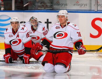 BUFFALO, NY - MARCH 15: Jussi Jokinen #36 of the Carolina Hurricanes streches during warm ups prior to play against the Buffalo Sabres at HSBC Arena on March 15, 2011 in Buffalo, New York. Carolina won 1-0.  (Photo by Rick Stewart/Getty Images)