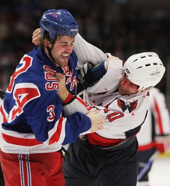 NEW YORK - NOVEMBER 17:  Aaron Voros #34 of the New York Rangers and Matt Bradley #10 of the Washington Capitals fight during first period action at Madison Square Garden on November 17, 2009 in New York, New York.  (Photo by Bruce Bennett/Getty Images)