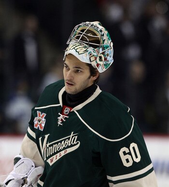 ST PAUL, MN - MARCH 22: Jose Theodore #60 of the Minnesota Wild skates in warmups prior to the game against the Toronto Maple Leafs at the Xcel Energy Center on March 22, 2011 in St Paul, Minnesota.  (Photo by Bruce Bennett/Getty Images)