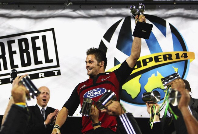 CHRISTCHURCH, NEW ZEALAND - MAY 31:  Crusaders captain Richie McCaw holds the Super 14 trophy aloft following the Crusaders win over the Waratahs in the Super 14 final at AMI Stadium on May 31, 2008 in Christchurch, New Zealand.  (Photo by Ross Land/Getty