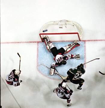 19 Jun 1999:  Goalie Dominik Hasek #39 of the Buffalo Sabres misses the final puck which was shot by Brett Hull #22 of the Dallas Stars during the Stanley Cup Finals game at the Marine Midland Arena in Buffalo, New York. The Dallas Stars defeated the Sabr