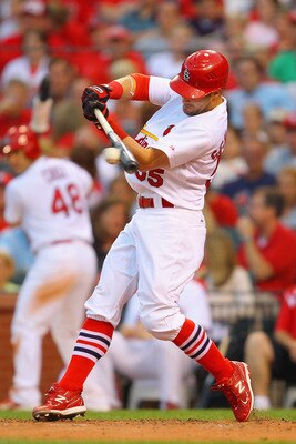 ST. LOUIS, MO - JUNE 23: Skip Schumaker #55 of the St. Louis Cardinals hits a sacrifice RBI against the Philadelphia Phillies at Busch Stadium on June 23, 2011 in St. Louis, Missouri.  (Photo by Dilip Vishwanat/Getty Images)