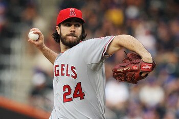 NEW YORK, NY - JUNE 18:  Dan Haren #24 of the Los Angeles Angels of Anaheim pitches against the New York Mets during their game on June 18, 2011 at Citi Field in the Flushing neighborhood of the Queens borough of New York City.  (Photo by Al Bello/Getty I