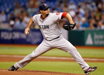 ST PETERSBURG, FL - JUNE 15:  :  Pitcher Josh Beckett #19 of the Boston Red Sox pitches against the Tampa Bay Rays during the game at Tropicana Field on June 15, 2011 in St. Petersburg, Florida.  (Photo by J. Meric/Getty Images)