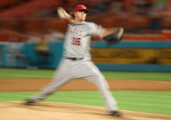 MIAMI GARDENS, FL - JUNE 20:  Jared Weaver #36 of the Los Angeles Angels of Anaheim pitches during a game against the Florida Marlins at Sun Life Stadium on June 20, 2011 in Miami Gardens, Florida.  (Photo by Mike Ehrmann/Getty Images)