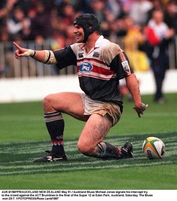 Michael Jones celebrates after scoring the first try of the 1997 Super 12 Final.