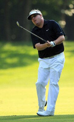 CHARLOTTE, NC - MAY 06:  Carl Pettersson watches a shot on the 12th hole during the second round of the Wells Fargo Championship at Quail Hollow Club on May 6, 2011 in Charlotte, North Carolina.  (Photo by Streeter Lecka/Getty Images)