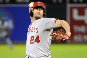 OAKLAND, CA - JULY 15: Dan Haren #24 of the Los Angeles Angels pitches against the Oakland Athletics in the seventh inning during an MLB baseball game at the O.co Coliseum July 15, 2011 in Oakland, California. The Athletics won the game 5-3. (Photo by The