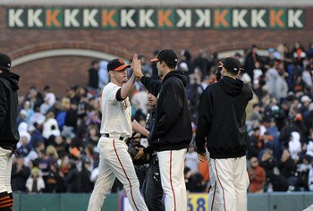 SAN FRANCISCO, CA - JUNE 26: Aubrey Huff #17 and teammates of the San Francisco Giants celebrate defeating the Cleveland Indians 3-1 in a MLB baseball game at AT&T Park June 26, 2011 in San Francisco, California. (Photo by Thearon W. Henderson/Getty Image