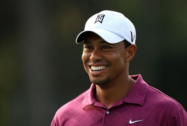 PONTE VEDRA BEACH, FL - MAY 11:  Tiger Woods smiles during a practice round prior to the start of THE PLAYERS Championship held at THE PLAYERS Stadium course at TPC Sawgrass on May 11, 2011 in Ponte Vedra Beach, Florida.  (Photo by Streeter Lecka/Getty Im