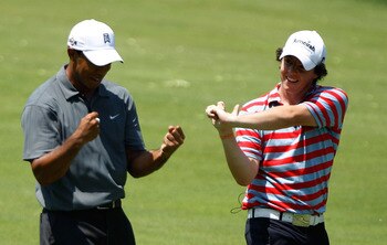 DUBLIN, OH - JUNE 02:  Tiger Woods (L) and Rory McIlroy of Northern Ireland wait in a fairway during the Memorial Skins Game prior to the start of the 2010 Memorial Tournament at the Muirfield Village Golf Club on June 2, 2010 in Dublin, Ohio.  (Photo by 