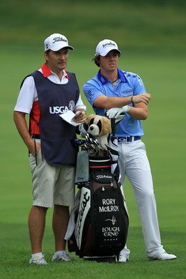 BETHESDA, MD - JUNE 19:  Rory McIlroy of Northern Ireland (R) stands alongside his bag and caddie J.P. Fitzgerald (L) during the final round of the 111th U.S. Open at Congressional Country Club on June 19, 2011 in Bethesda, Maryland.  (Photo by David Cann