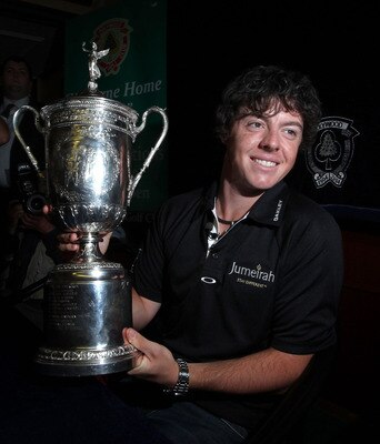 BELFAST, NORTHERN IRELAND - JUNE 22:  US Open winning golfer Rory McIlroy poses with his trophy at Holywood Golf Club on June 22, 2011 in Belfast, Northern Ireland. The 22 year old golfer has returned home to his native Northern Ireland and is giving pres