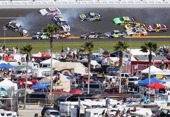 DAYTONA BEACH, FL - FEBRUARY 20:  Several cars are involved in a crash on lap 29 during the NASCAR Sprint Cup Series Daytona 500 at Daytona International Speedway on February 20, 2011 in Daytona Beach, Florida.  (Photo by Jamie Squire/Getty Images)
