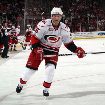 NEWARK, NJ - FEBRUARY 16:  Erik Cole #26 of the Carolina Hurricanes skates against the New Jersey Devils at the Prudential Center on February 16, 2011 in Newark, New Jersey.  (Photo by Bruce Bennett/Getty Images)