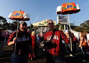 PASADENA, CA - JANUARY 07:  Fans of the Alabama Crimson Tide stand outside the stadium prior to the game against the Texas Longhorns in the Citi BCS National Championship game at the Rose Bowl on January 7, 2010 in Pasadena, California.  (Photo by Kevork