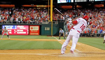 PHILADELPHIA - JUNE 24:  Ben Francisco #10 of the Philadelphia Phillies gets a walk off winning hit in the bottom of the ninth against the Oakland Athletics at Citizens Bank Park on June 24, 2011 in Philadelphia, Pennsylvania. The Phillies defeated the At