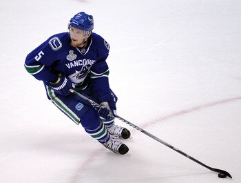VANCOUVER, BC - JUNE 10:  Christian Ehrhoff #5 of the Vancouver Canucks skates during Game Five of the 2011 NHL Stanley Cup Final at Rogers Arena on June 10, 2011 in Vancouver, British Columbia, Canada.  (Photo by Harry How/Getty Images)