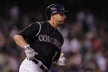 DENVER, CO - JUNE 09:  Troy Tulowitzki #2 of the Colorado Rockies rounds first on his two RBI double off of starting pitcher Clayton Kershaw of the Los Angeles Dodgers in the fifth inning at Coors Field on June 9, 2011 in Denver, Colorado.  (Photo by Doug