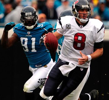 JACKSONVILLE, FL - DECEMBER 06:  Derrick Harvey #91 of the Jacksonville Jaguars pressures Matt Schaub #8 of the Houston Texnas during the game at Jacksonville Municipal Stadium on December 6, 2009 in Jacksonville, Florida.  (Photo by Sam Greenwood/Getty I