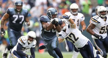 SEATTLE - SEPTEMBER 26:  Running back Justin Forsett #20 of the Seattle Seahawks rushes against Eric Weddle #32 of the San Diego Chargers at Qwest Field on September 26, 2010 in Seattle, Washington. The Seahawks defeated the Chargers 27-20. (Photo by Otto