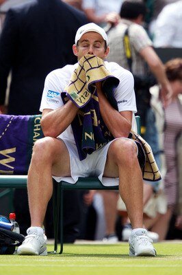 LONDON, ENGLAND - JUNE 24:  Andy Roddick of the United States wipes his face with a towel during his third round match against Feliciano Lopez of Spain on Day Five of the Wimbledon Lawn Tennis Championships at the All England Lawn Tennis and Croquet Club 