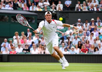 LONDON, ENGLAND - JUNE 23:  Lleyton Hewitt of Australia reaches for a shot during his second round match against Robin Soderling of Sweden on Day Four of the Wimbledon Lawn Tennis Championships at the All England Lawn Tennis and Croquet Club on June 23, 2