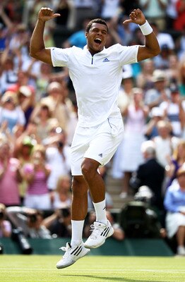 LONDON, ENGLAND - JUNE 29:  Jo-Wilfried Tsonga of France celebrates after winning his quarterfinal round match against Roger Federer of Switzerland on Day Nine of the Wimbledon Lawn Tennis Championships at the All England Lawn Tennis and Croquet Club on J