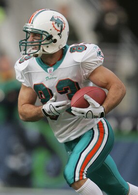 SEATTLE, WA - NOVEMBER 21: Wide receiver Wesley Welker #83 of the Miami Dolphins runs upfield against the Seattle Seahawks during the game at Qwest Field on November 21, 2004 in Seattle, Washington. The Seahawks defeated the Dolphins 24-17. (Photo by Jeff