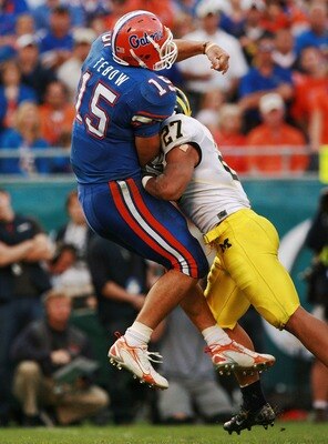 Tim Tebow and Brandon Harrison