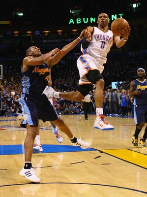 OKLAHOMA CITY, OK - APRIL 27: Russell Westbrook #0 of the Oklahoma City Thunder drives to the basket against Arron Afflalo #6 of the Denver Nuggets in Game Five of the Western Conference Quarterfinals in the 2011 NBA Playoffs on April 27, 2011 at the Ford